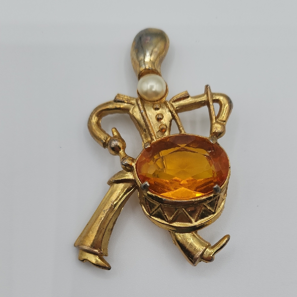 Made In The U.S.A. Vintage Golden Drummer Brooch with Large Golden Gemstone